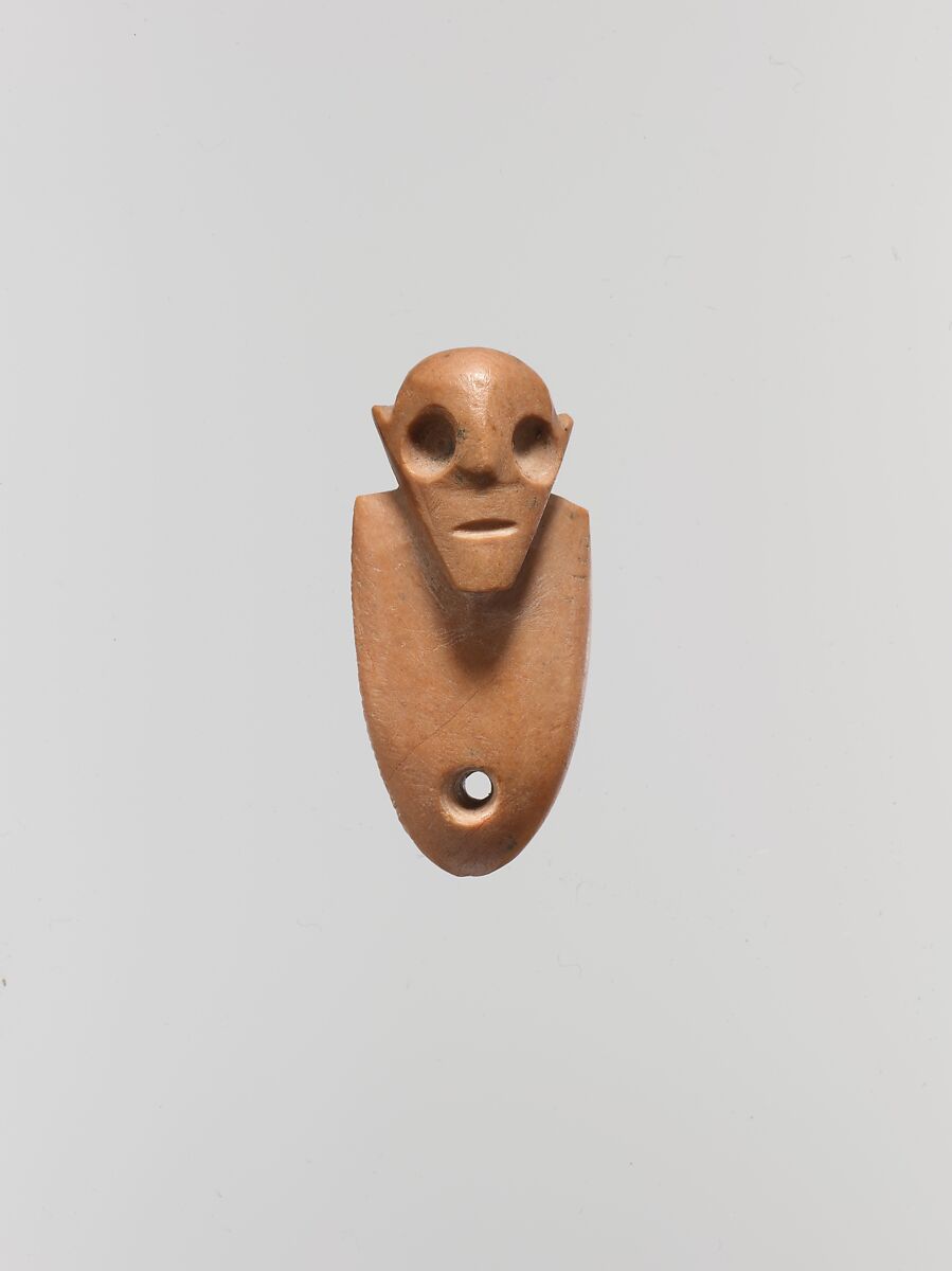 Amuletic figure, Limestone (pink) 