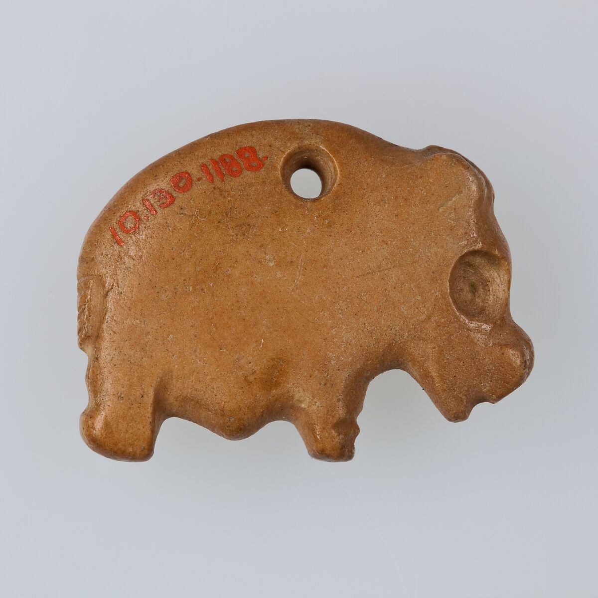 Amulet in the form of a hippo, Limestone (pink)
