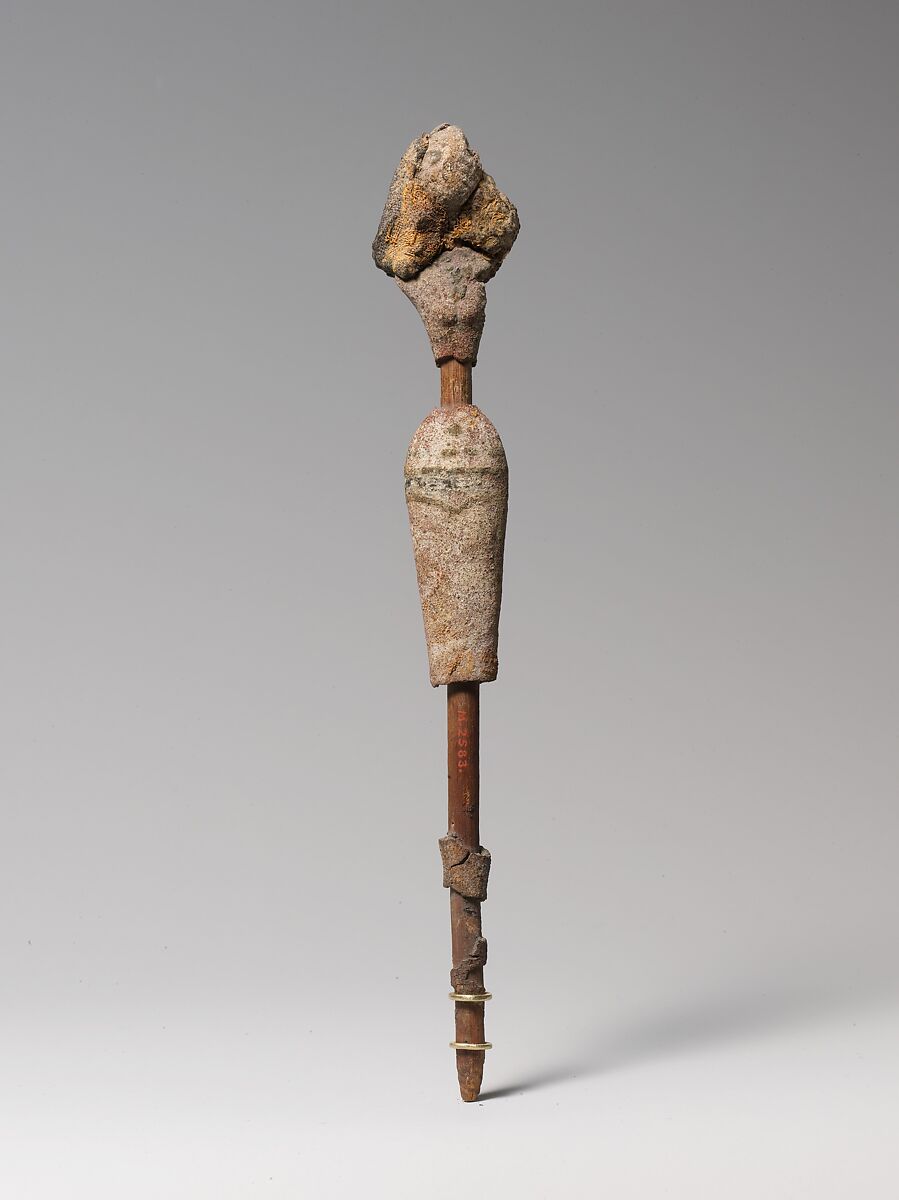 Female figurine on a reed, Wood, sandy mud/clay (?), organic material, paint, linen, reed 