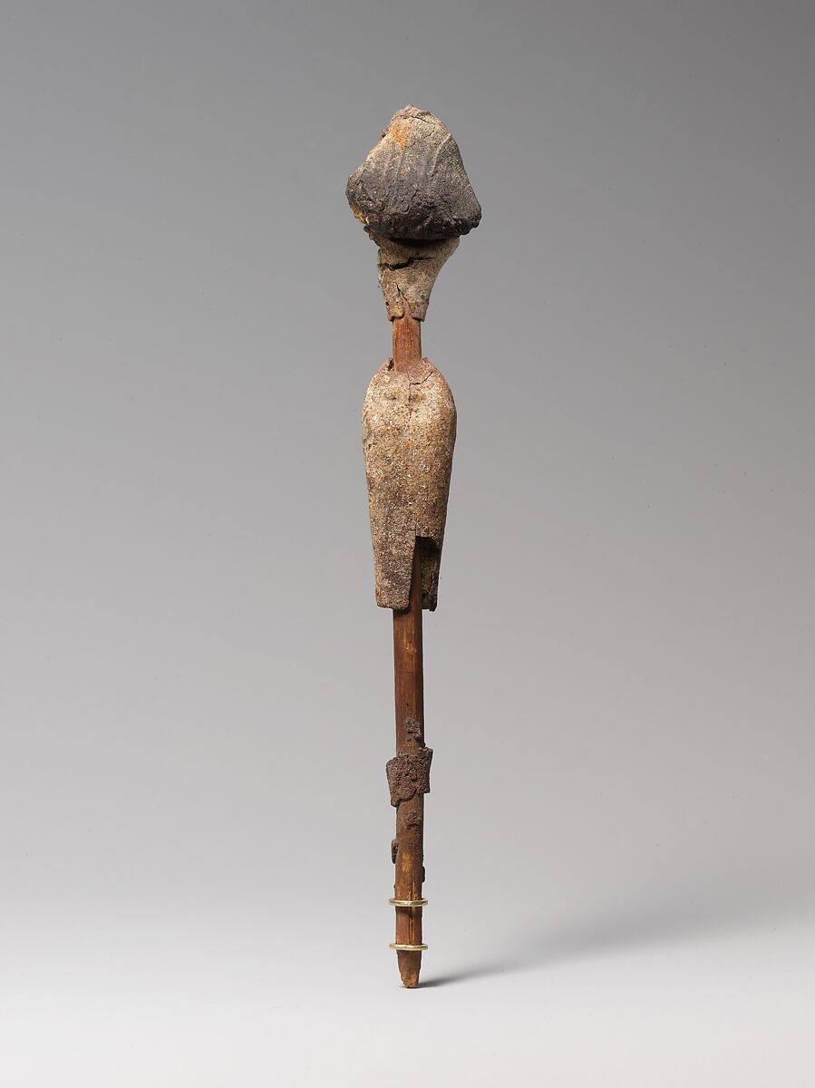 Female figurine on a reed, Wood, sandy mud/clay (?), organic material, paint, linen, reed
