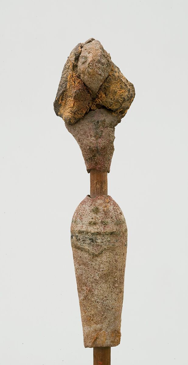 Female figurine on a reed, Wood, sandy mud/clay (?), organic material, paint, linen, reed