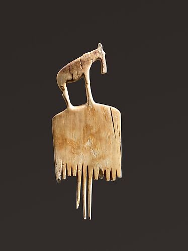 Comb decorated with a wildebeest