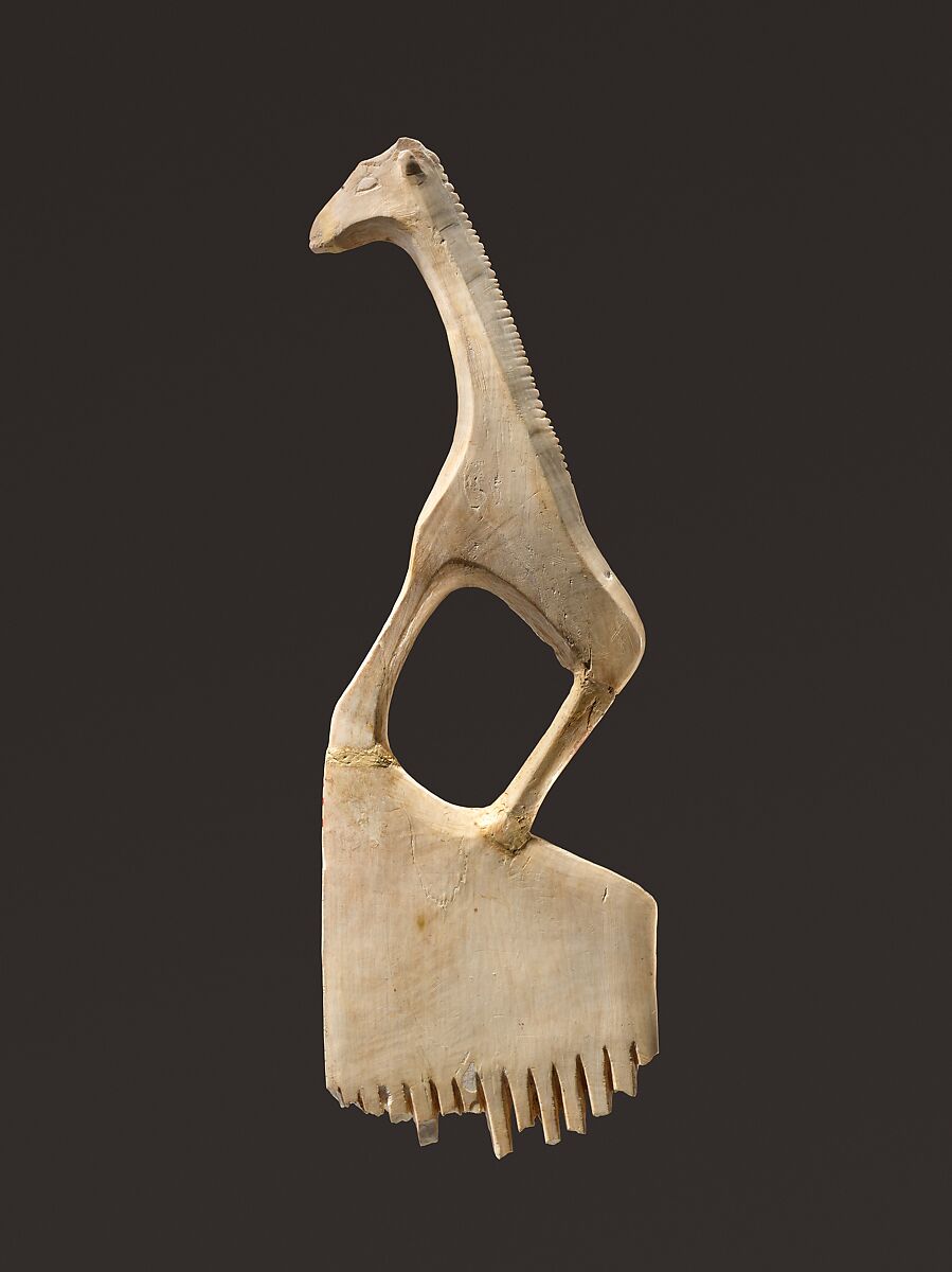 Comb with a giraffe, Ivory (elephant)