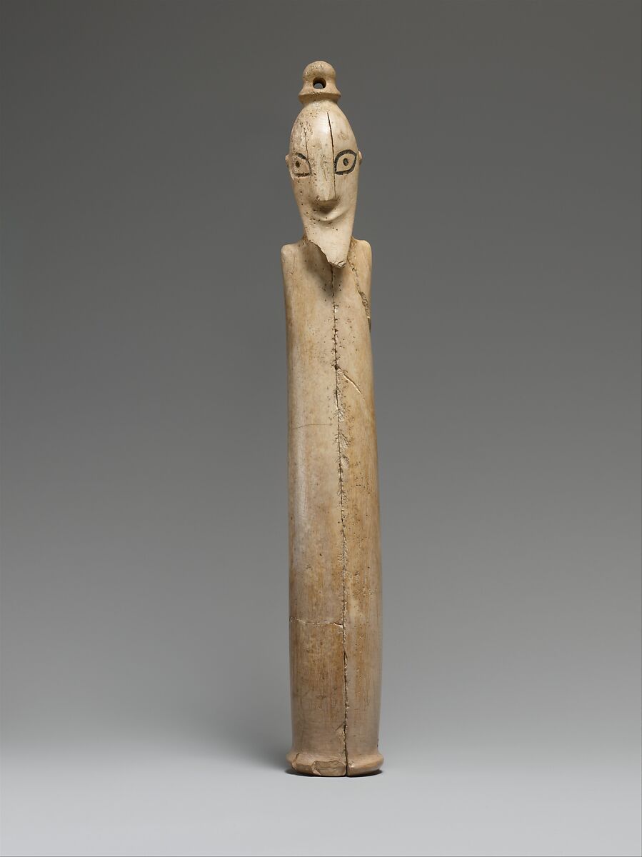 A Tusk Figurine of a Man, Probably elephant ivory and organic material 