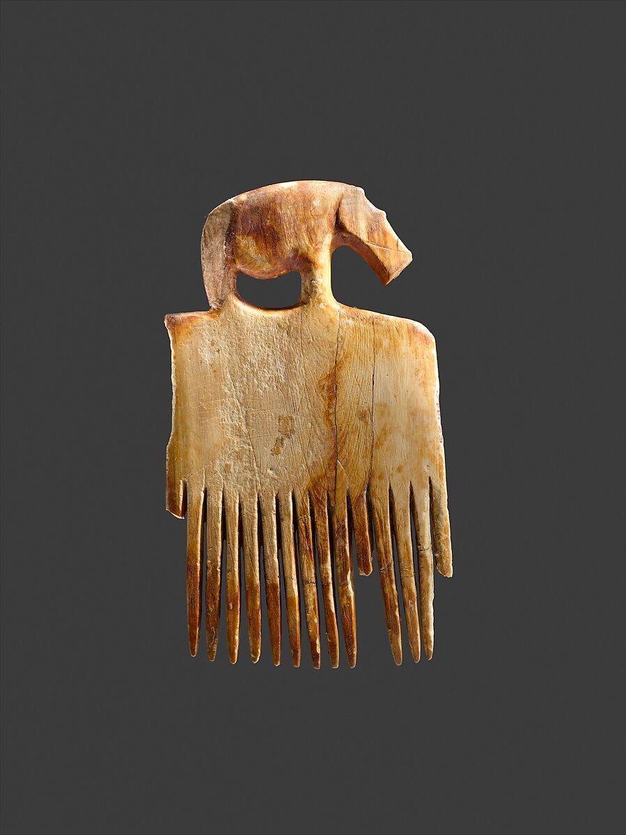 Comb decorated with a hippo, Ivory (elephant) 