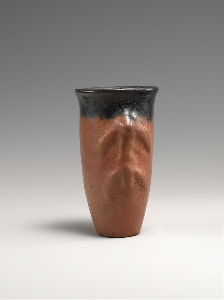 Black-topped red ware jar with a climbing animal, Pottery 
