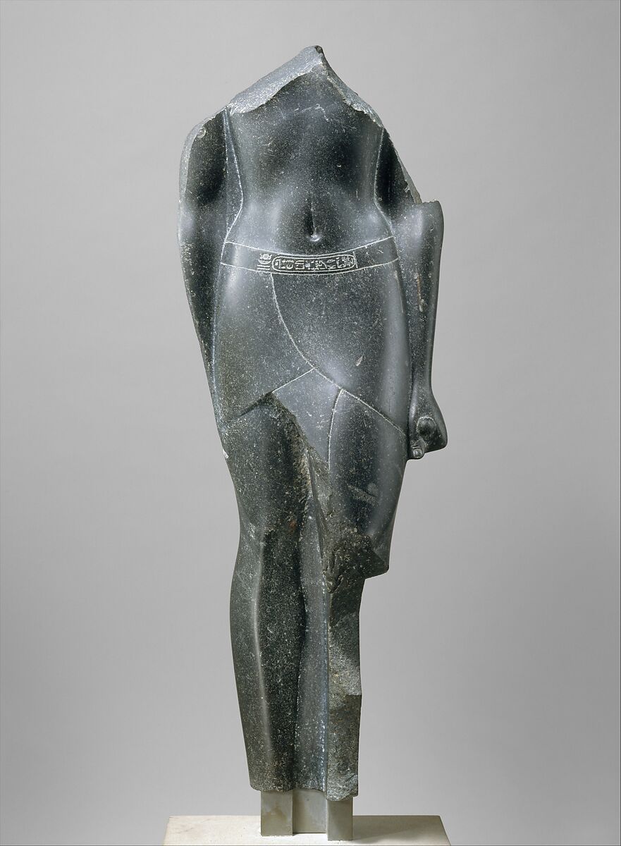 Torso of a Ptolemaic King, inscribed with cartouches of a late Ptolemy, Basalt 