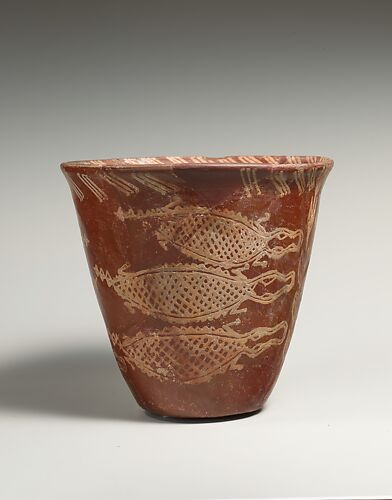 White cross-lined ware beaker with Nile River scene