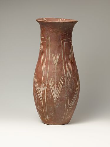 White cross-lined ware vase with plant designs