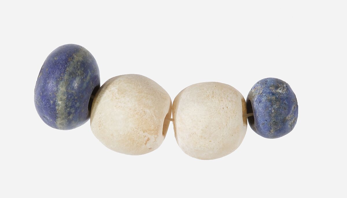 String of beads, Lapis lazuli, travertine (Egyptian alabaster) 