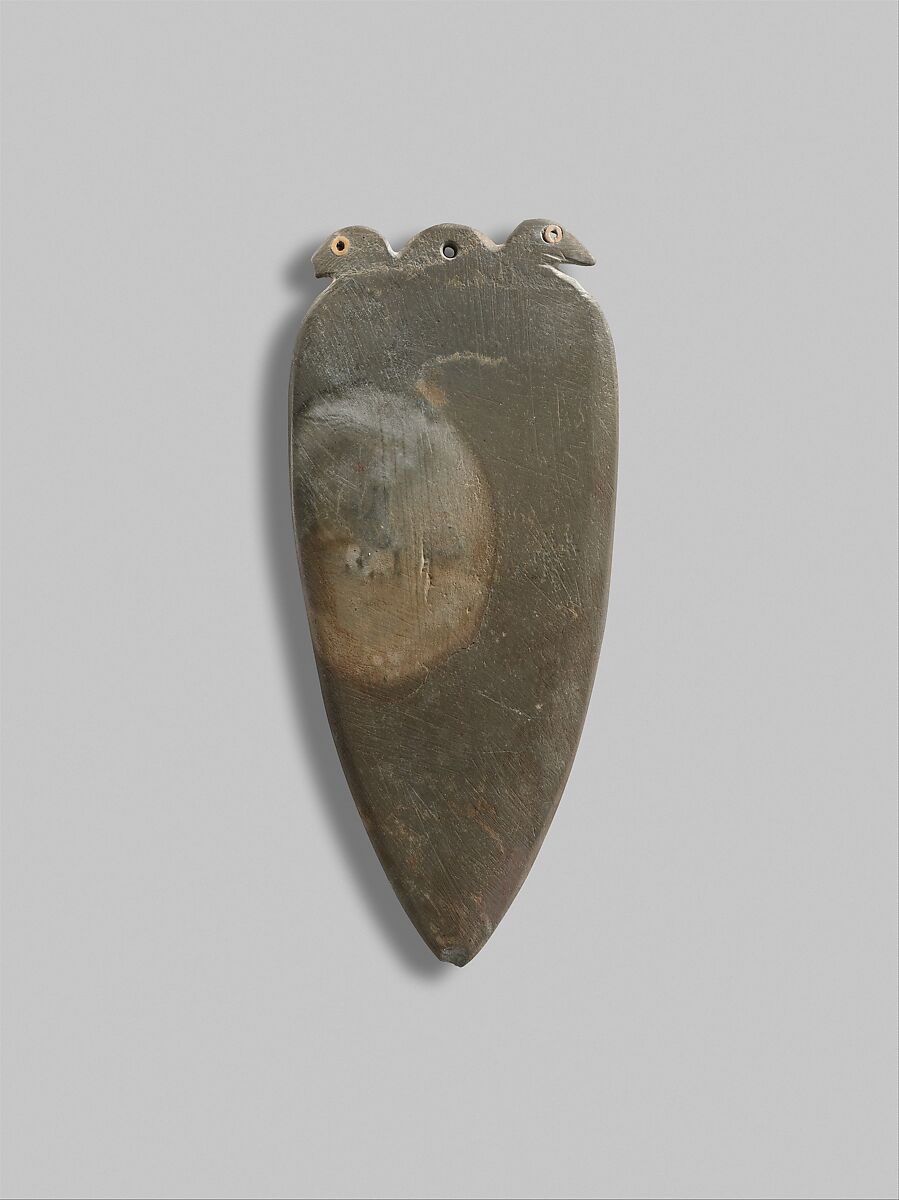 Palette with double bird heads with inlaid eyes, Greywacke, shell (?) 