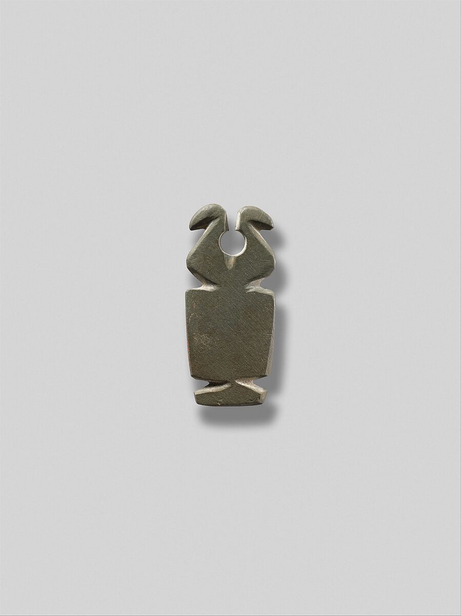 Amulet emphasizing a pair of horns, Greywacke
