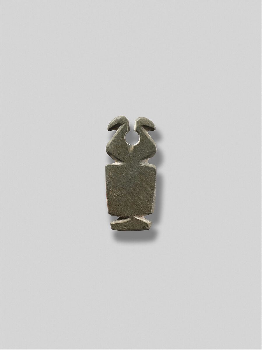 Amulet emphasizing a pair of horns, Greywacke 