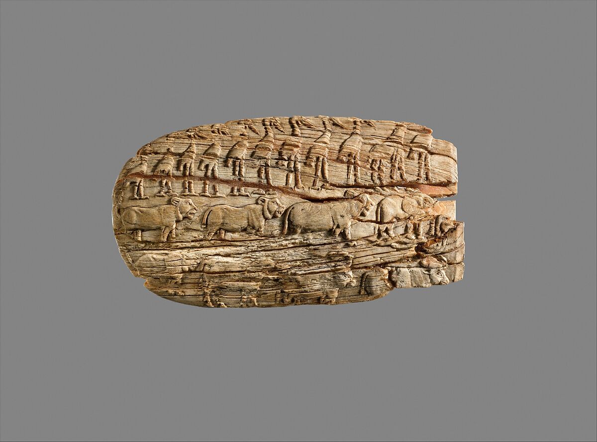 Carved handle of a ceremonial knife, Ivory 