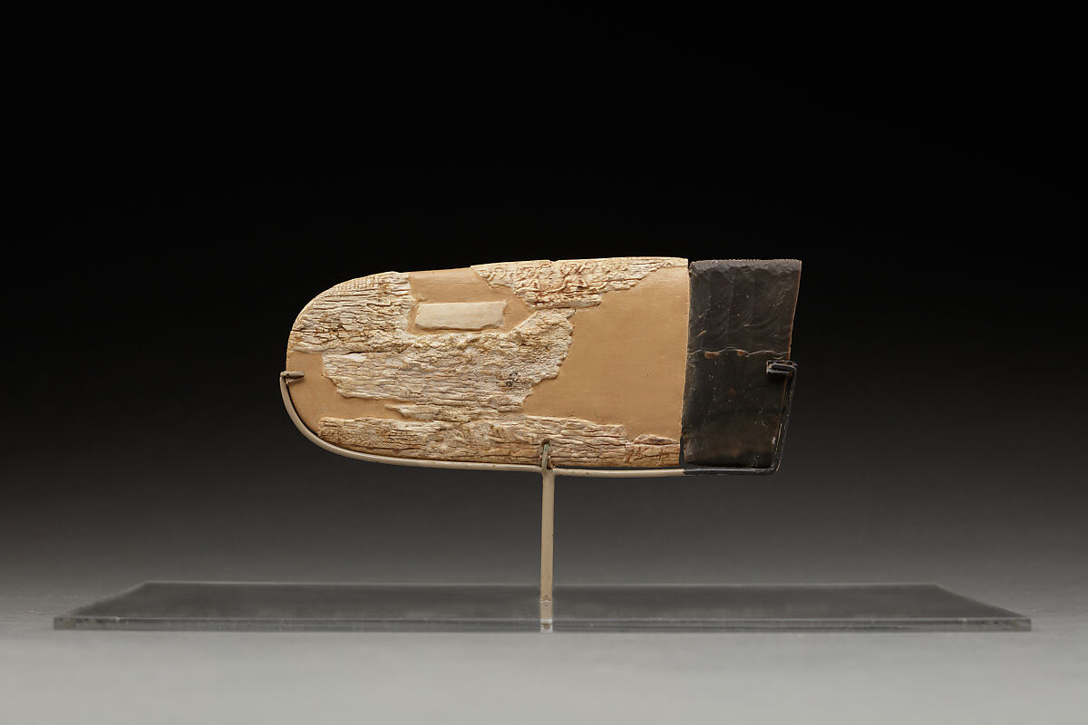 Carved handle of a ceremonial knife with part of the ripple-flaked knife, Ivory, flint