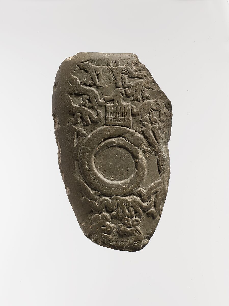 Carved ceremonial palette, Greywacke 