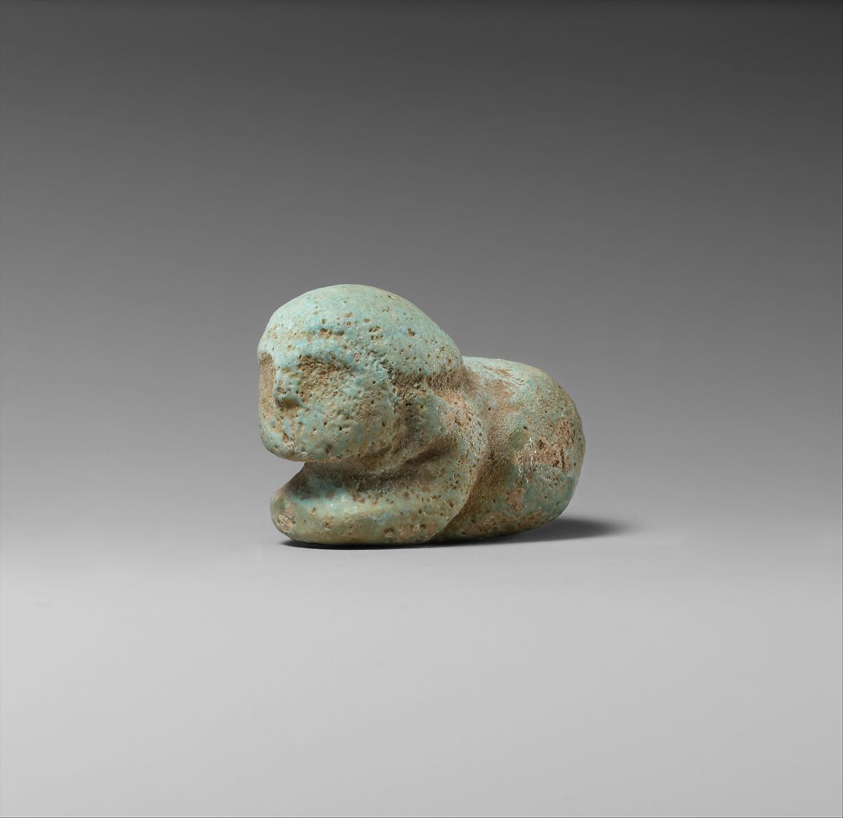 Figure of a Crouched Man, Faience 