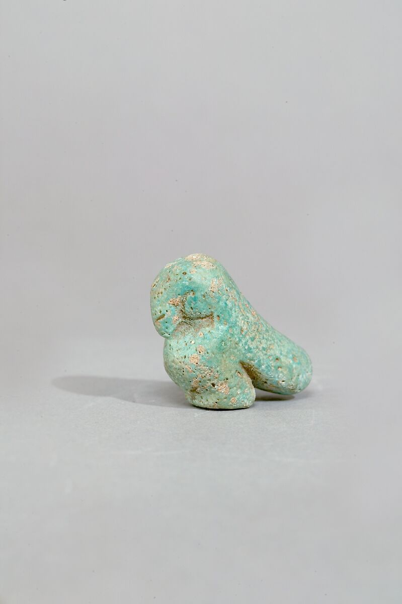 Figurine of a crouching falcon, Faience