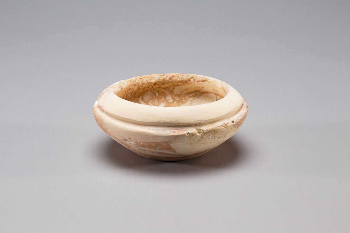 Small rimmed bowl, Fossiliferous limestone 