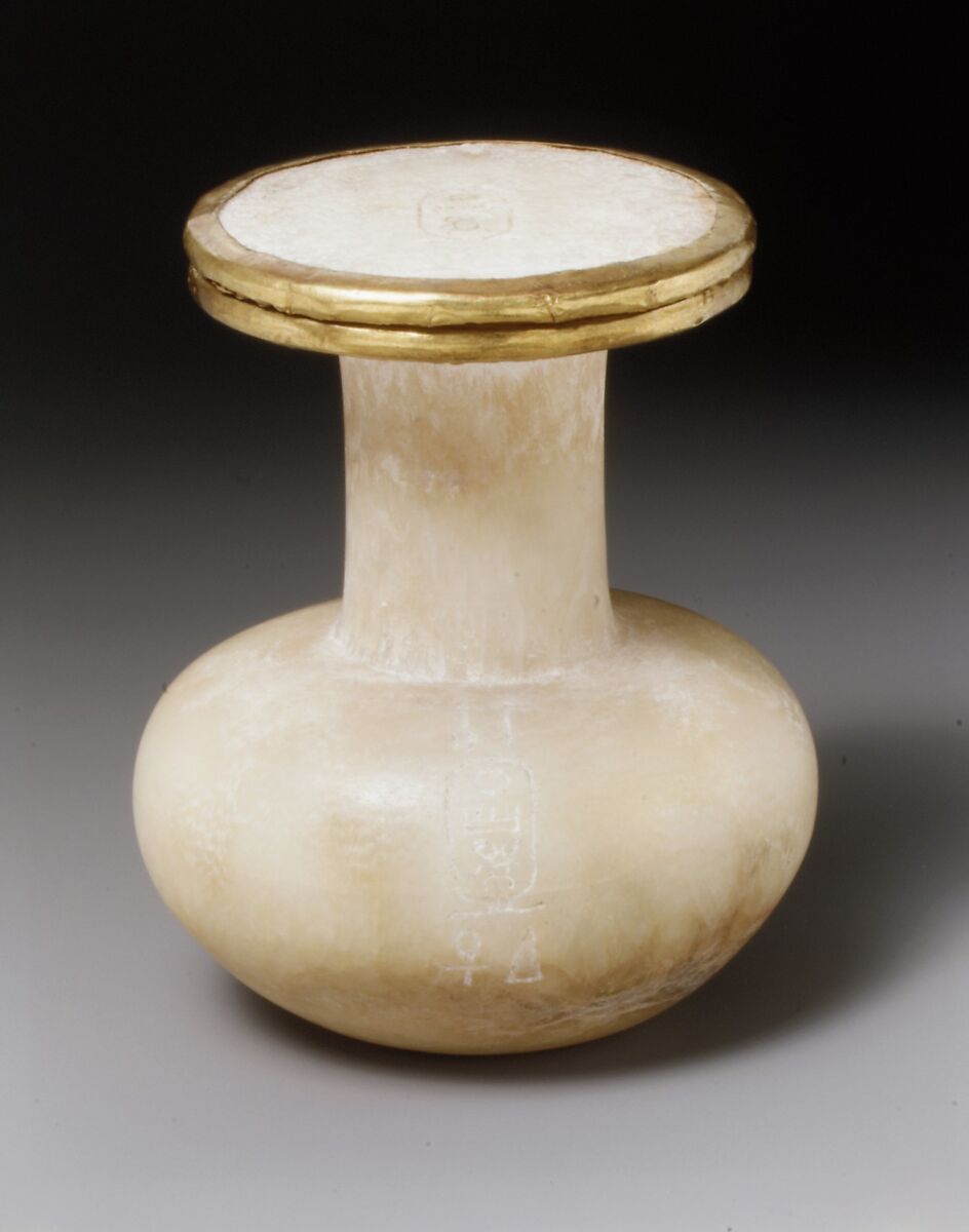 Bottle and lid naming Thutmose III, Homogenous travertine (Egyptian alabaster); gold leaf on edges of lip and lid 