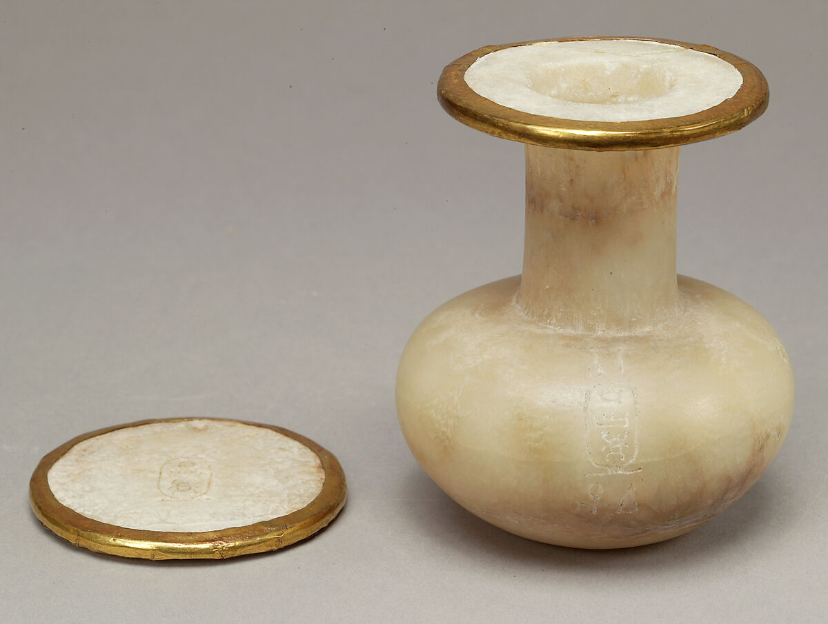 Bottle and lid naming Thutmose III, Homogenous travertine (Egyptian alabaster); gold leaf on edges of lip and lid
