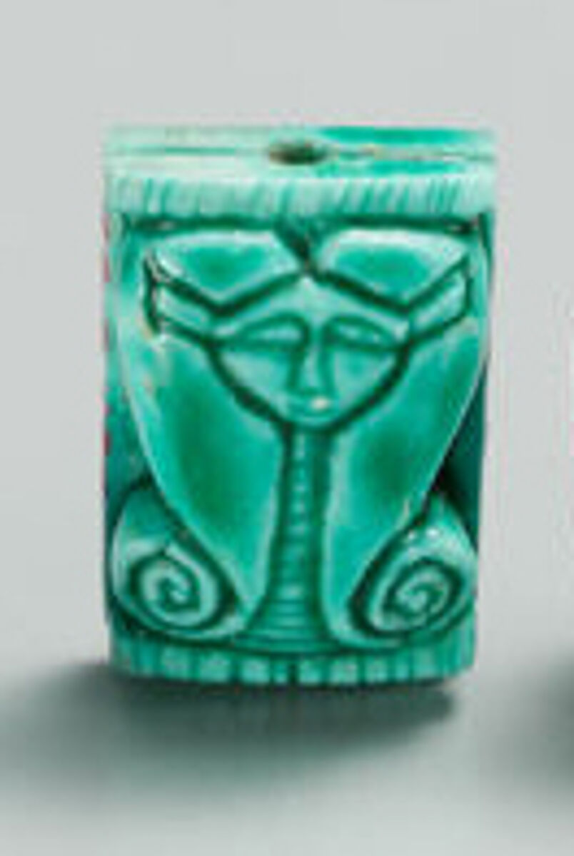 Hathor emblem seal inscribed to Amenhotep I, Steatite, green glazed 