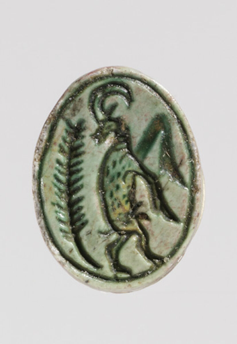 Scarab depicting a rearing ibex, Green glazed steatite 