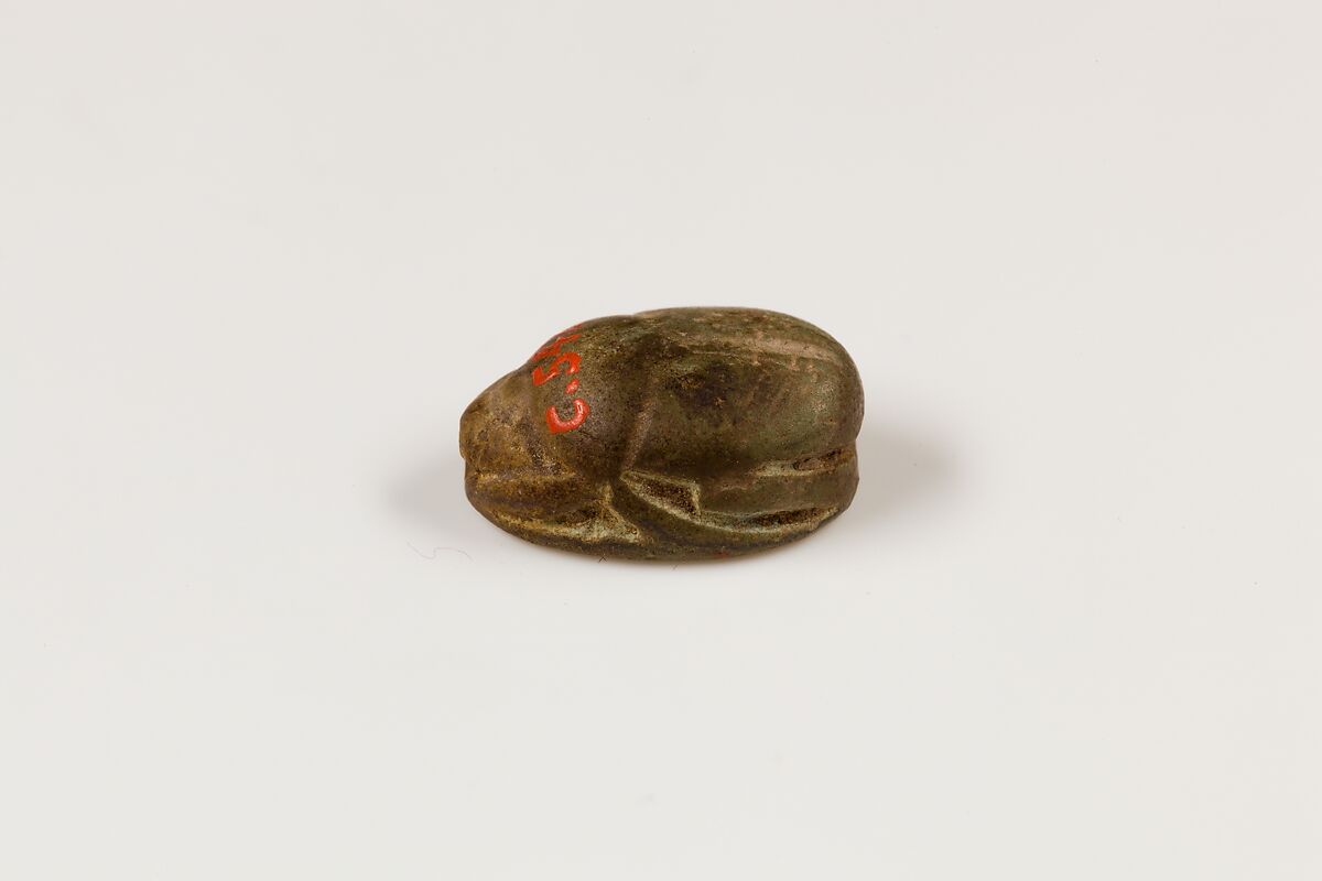 Scarab depicting a griffin, Green paste