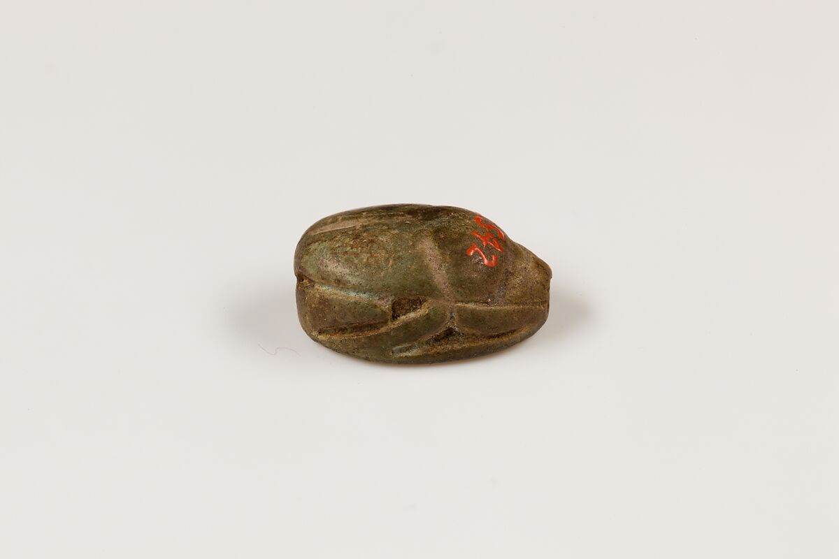 Scarab depicting a griffin, Green paste