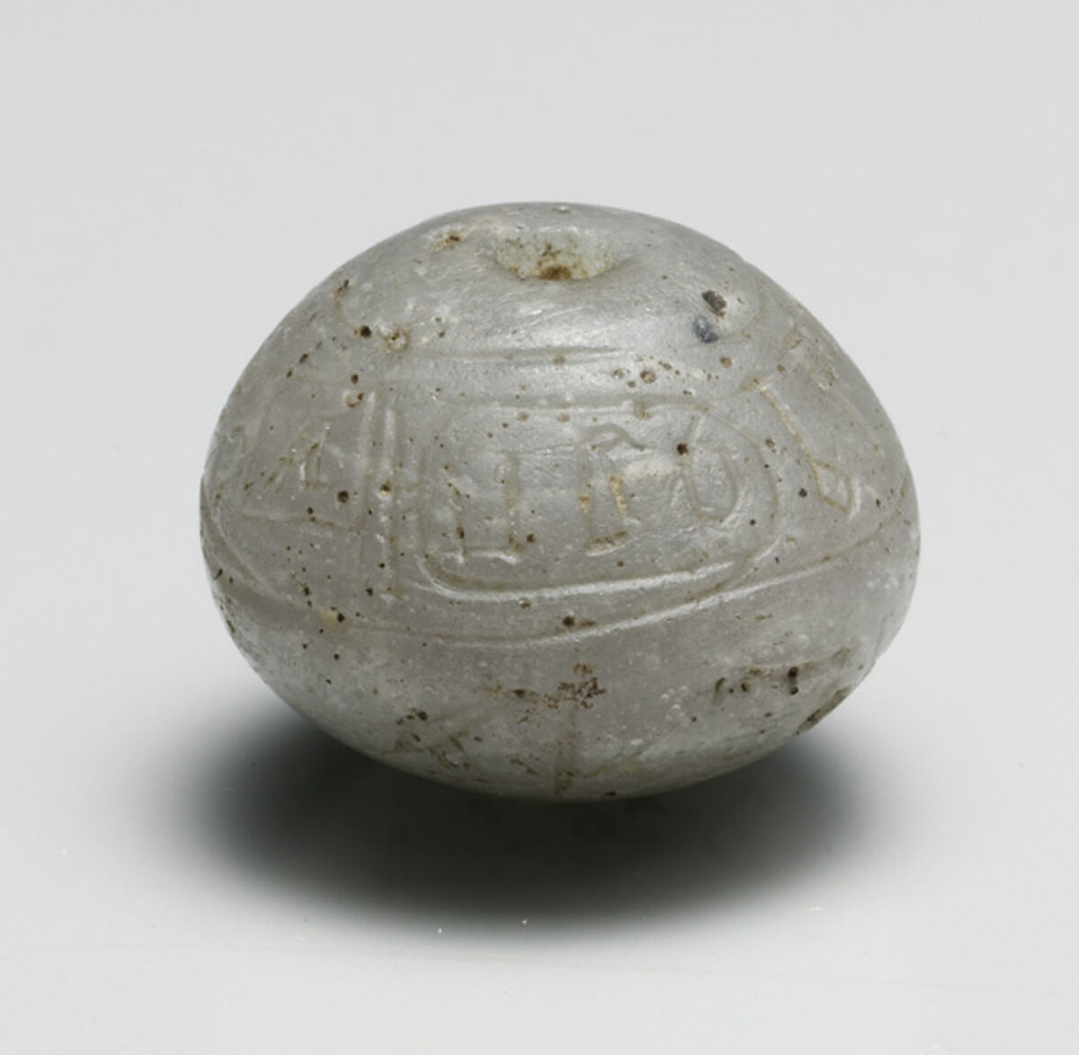 Ball Bead with the Names of Hatshepsut and the Overseer of Work Senenmut, Glass 