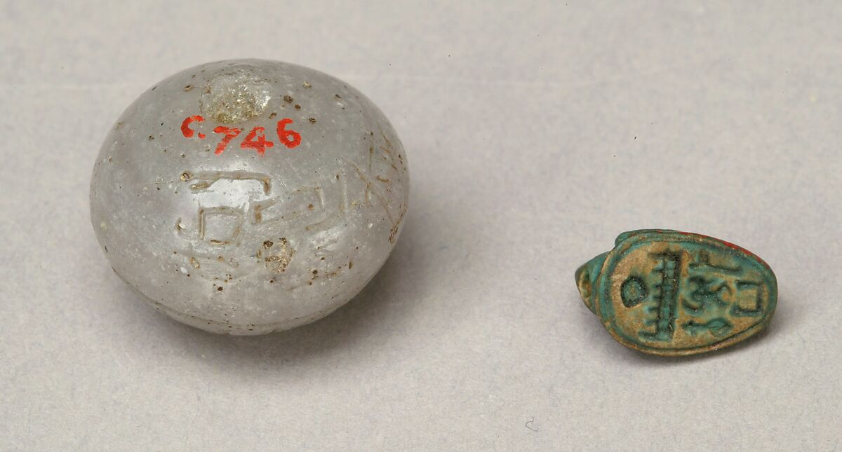 Ball Bead with the Names of Hatshepsut and the Overseer of Work Senenmut, Glass