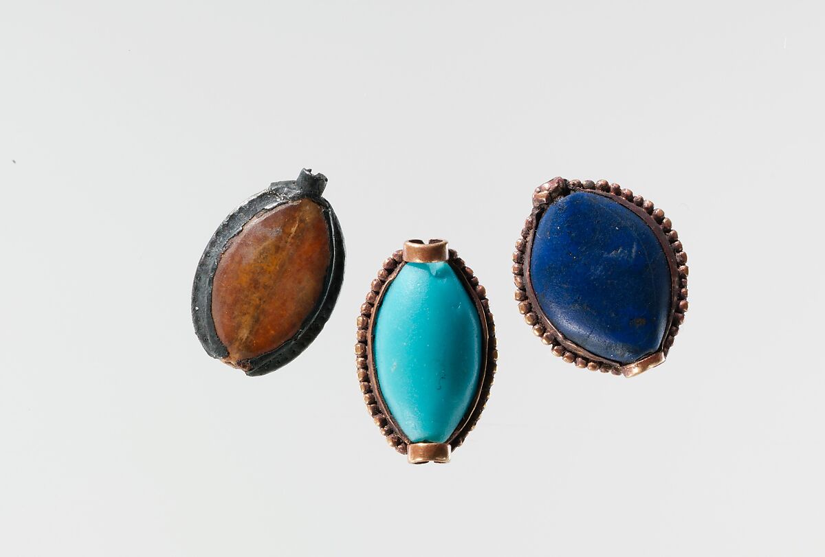 Cowroid bead, Travertine (Egyptian alabaster), silver