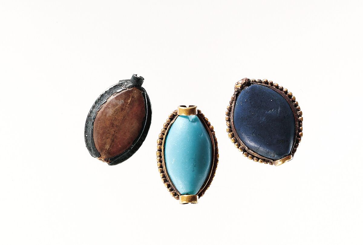 Cowroid bead, Travertine (Egyptian alabaster), silver