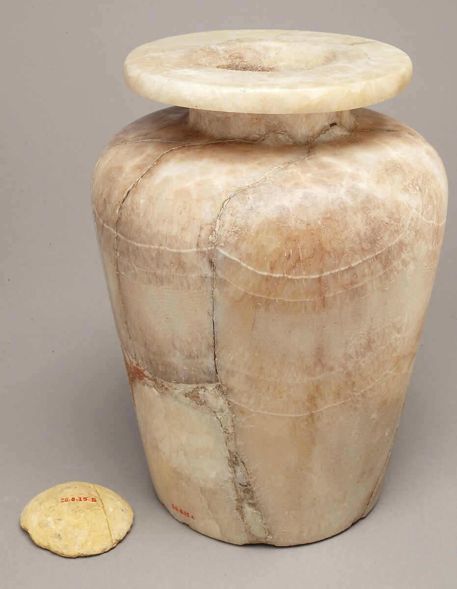 Inscribed shoulder jar with cartouche of Thutmose III, Crystalline travertine jar, limestone lid 