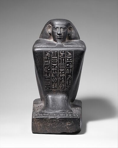 Block Statue of a Prophet of Montu and Scribe Djedkhonsuefankh, son of Khonsumes and Taat