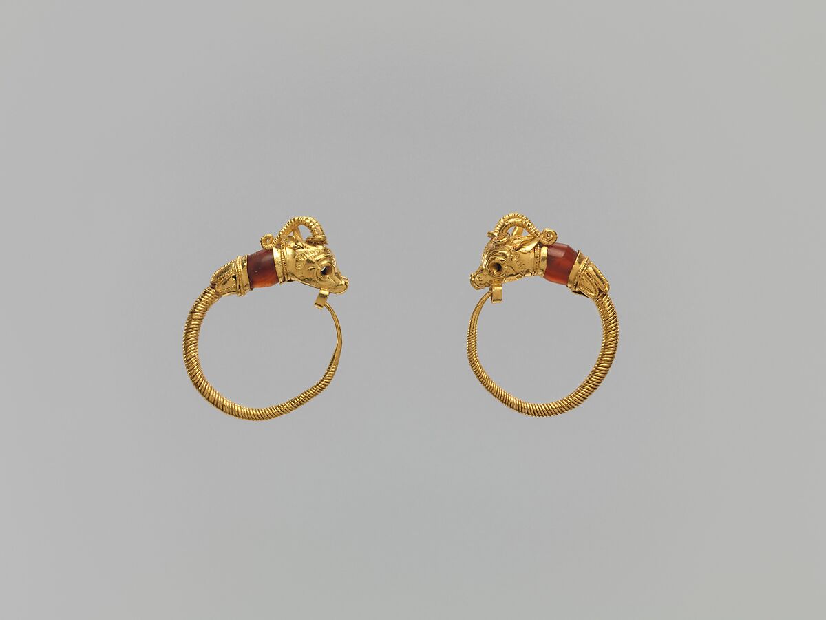 Ibex-head earrings, Gold; carnelian 