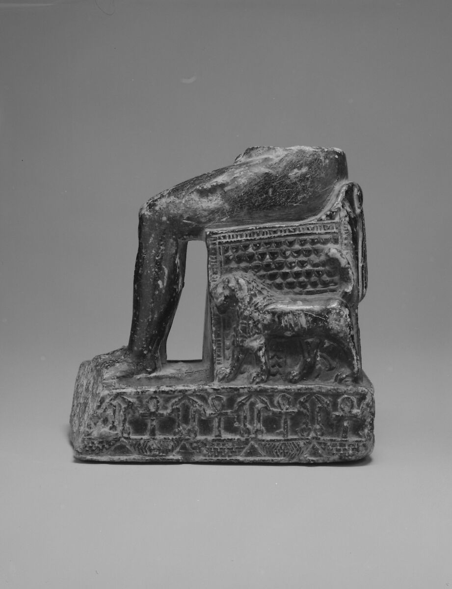Lower part of enthroned child god, probably Harpokrates, Chlorite schist