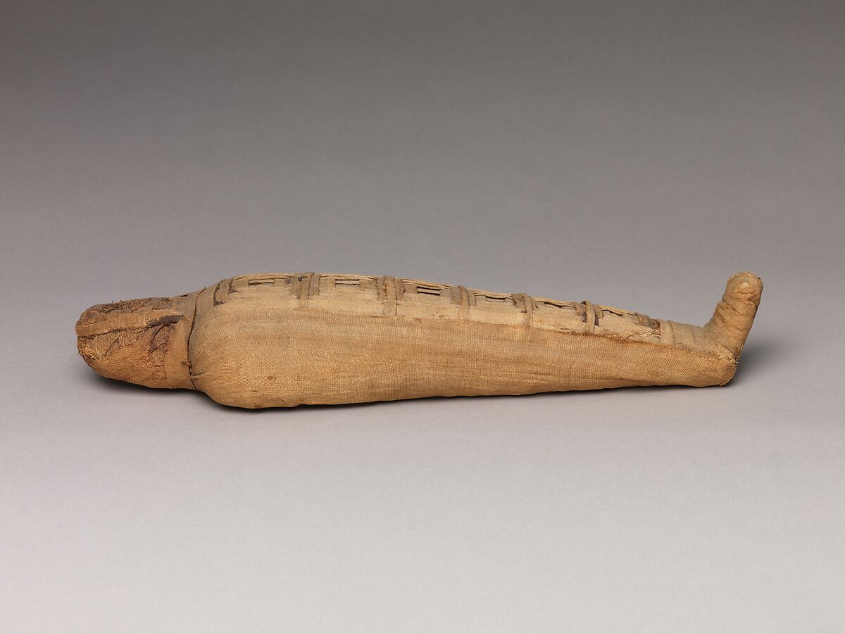 Sacred animal mummy in the form of a falcon, Linen, unidentified contents (no animal remains), mummification materials