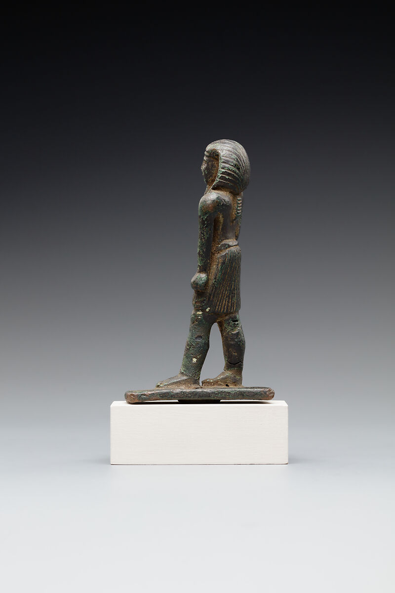 Male figure in a nemes and shendyt kilt, Leaded bronze