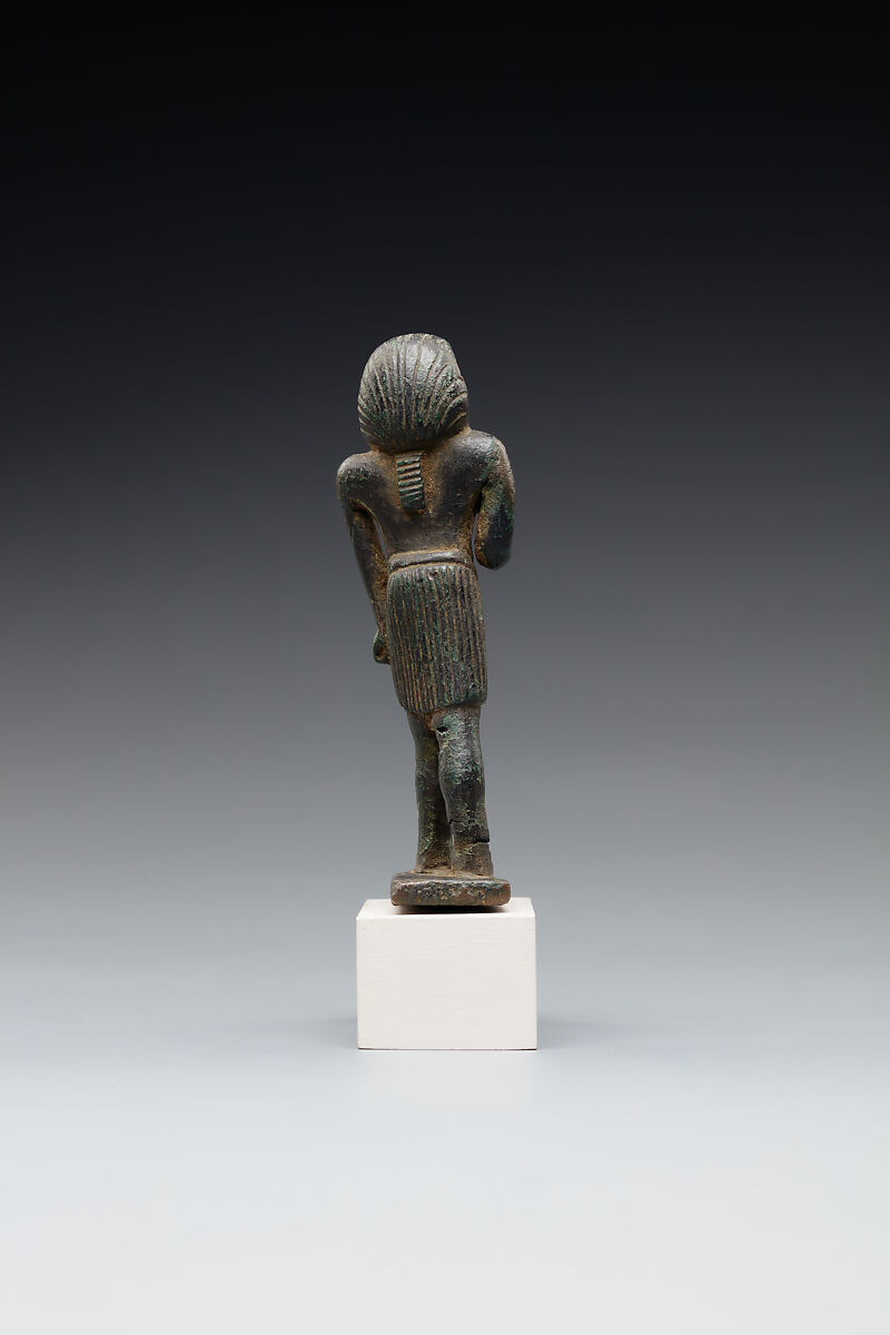 Male figure in a nemes and shendyt kilt, Leaded bronze
