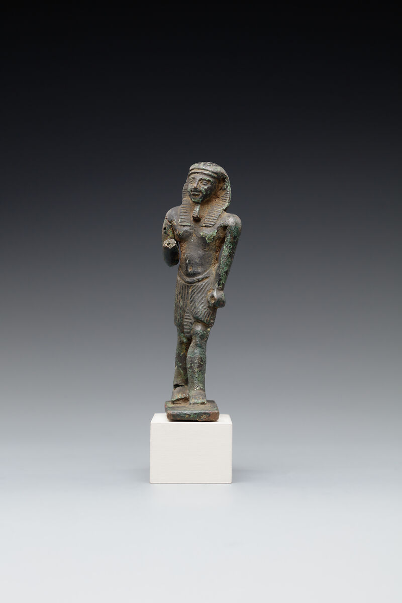 Male figure in a nemes and shendyt kilt, Leaded bronze 