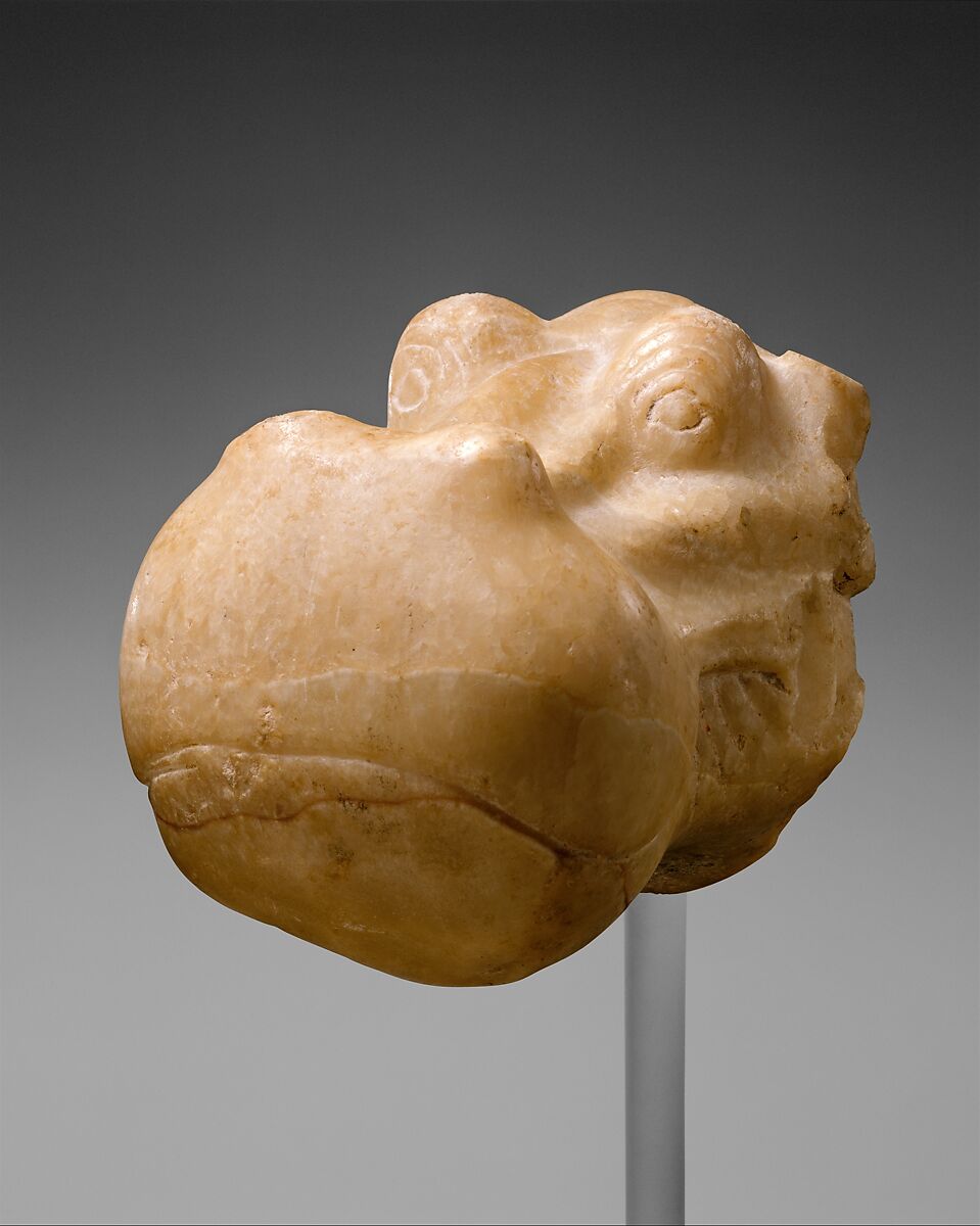 Head of a Hippopotamus, Travertine (Egyptian alabaster) with traces of gesso and red pigment