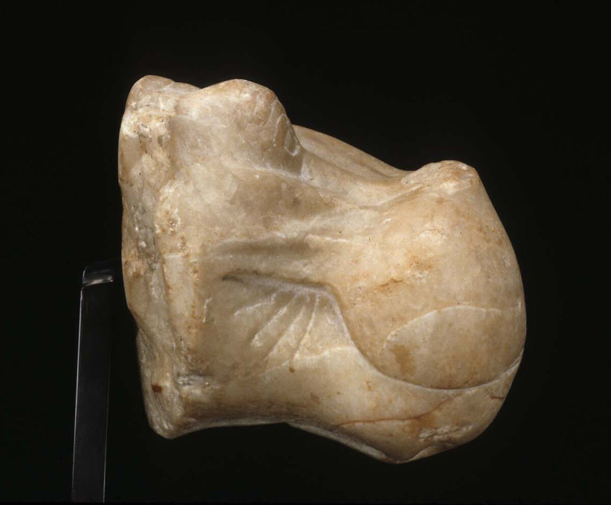 Head of a Hippopotamus, Travertine (Egyptian alabaster) with traces of gesso and red pigment