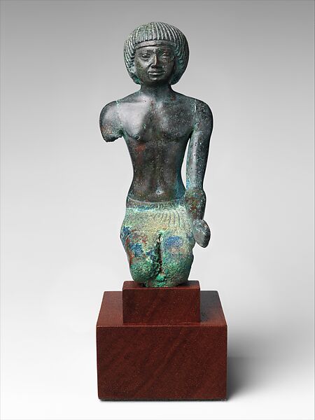 Kneeling ruler or priest, Leaded bronze 