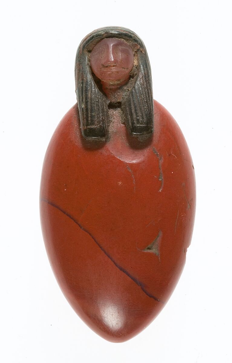 Heart amulet with human head, Jasper, carnelian, chlorite