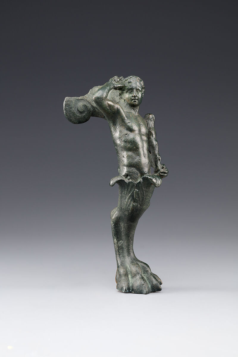 Vessel support combining the upper body of Herakles and a lion's foot, Bronze