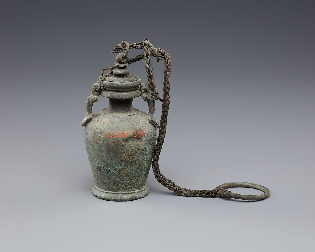 Bottle with stopper and suspension ring, possibly intended for unguent, Bronze or copper alloy