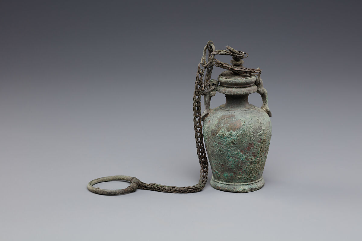 Bottle with stopper and suspension ring, possibly intended for unguent, Bronze or copper alloy