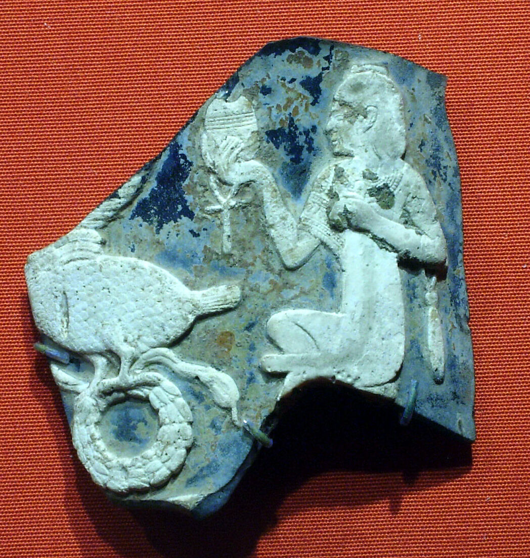 Cameo fragment from a kantharos (drinking cup) with an Egyptianizing scene, glass, white on blue 