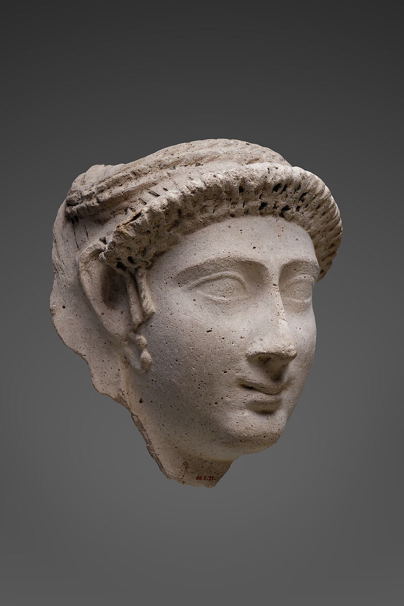 Mask of a woman with an ornate curled bang and loop earrings, Plaster, paint
